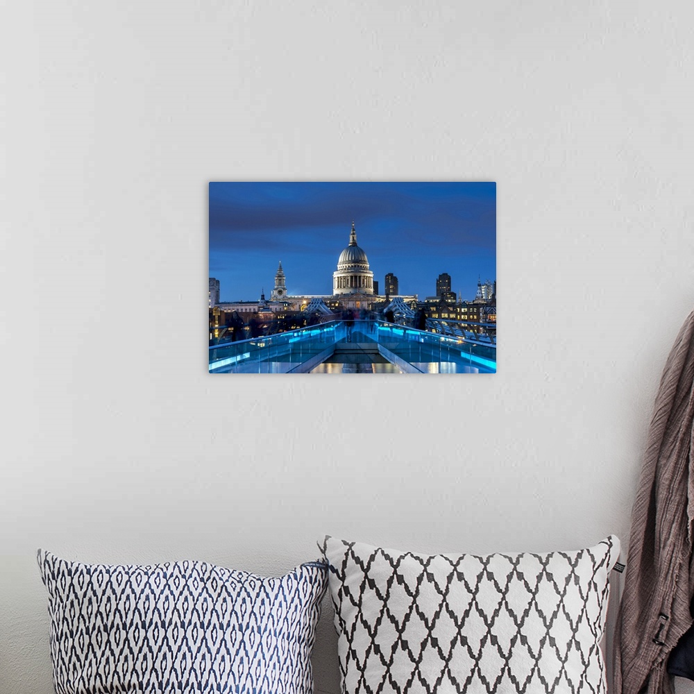 A bohemian room featuring The Millennium footbridge and St Paul's Cathedral at night.