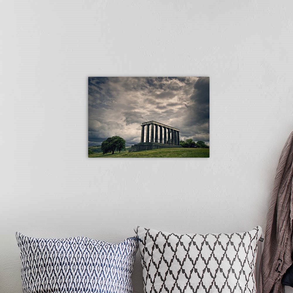 A bohemian room featuring The National Monument of Scotland on Calton Hill.