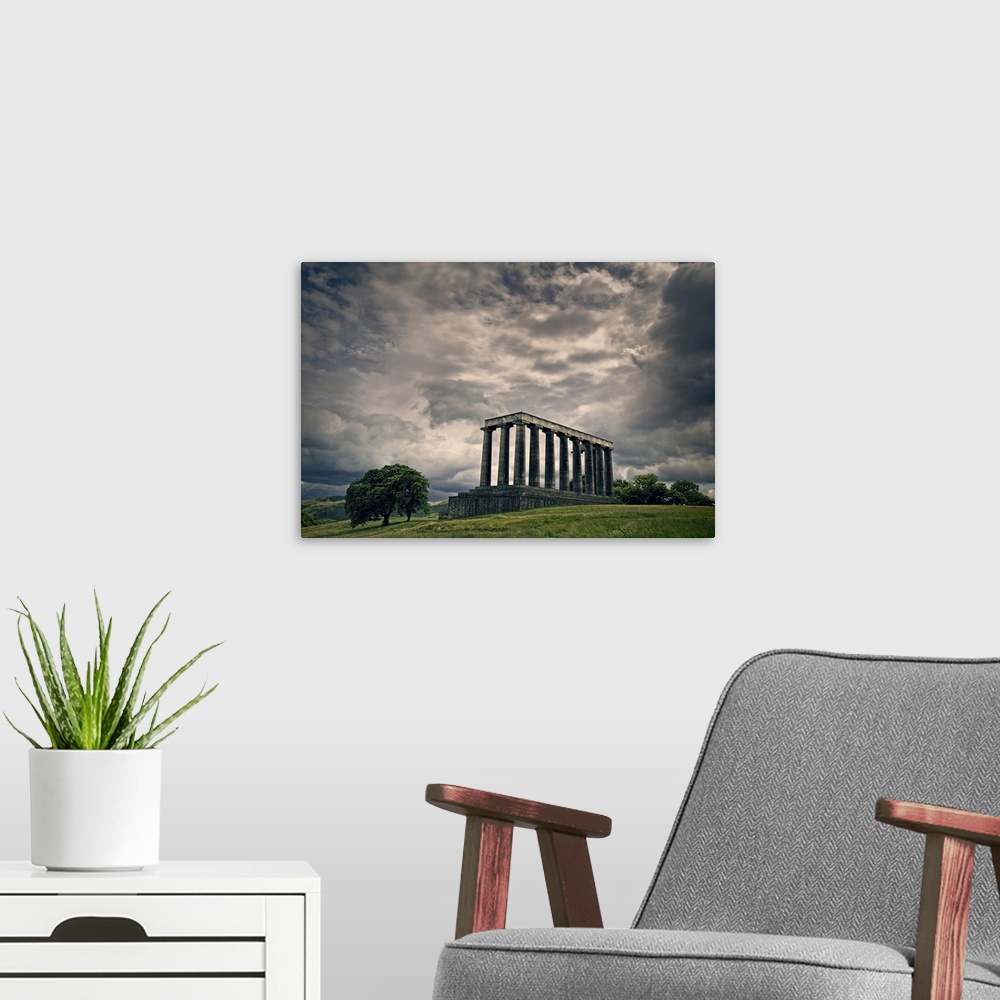 A modern room featuring The National Monument of Scotland on Calton Hill.