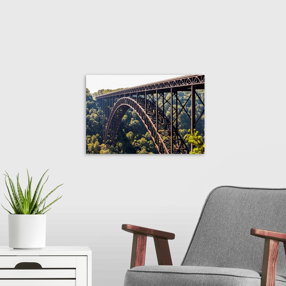 A modern room featuring The New River Gorge Bridge is a steel arch bridge 3,030 feet long over the New River Gorge near F...