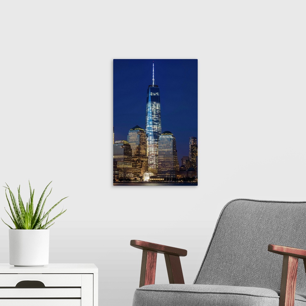 A modern room featuring The new World Trade Center at twilight, viewed from Jersey City, New Jersey. New York City, New Y...