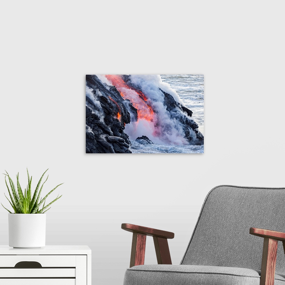 A modern room featuring The Pahoehoe lava flowing from Kilauea has reached the Pacific ocean near Kalapana; Island of Haw...