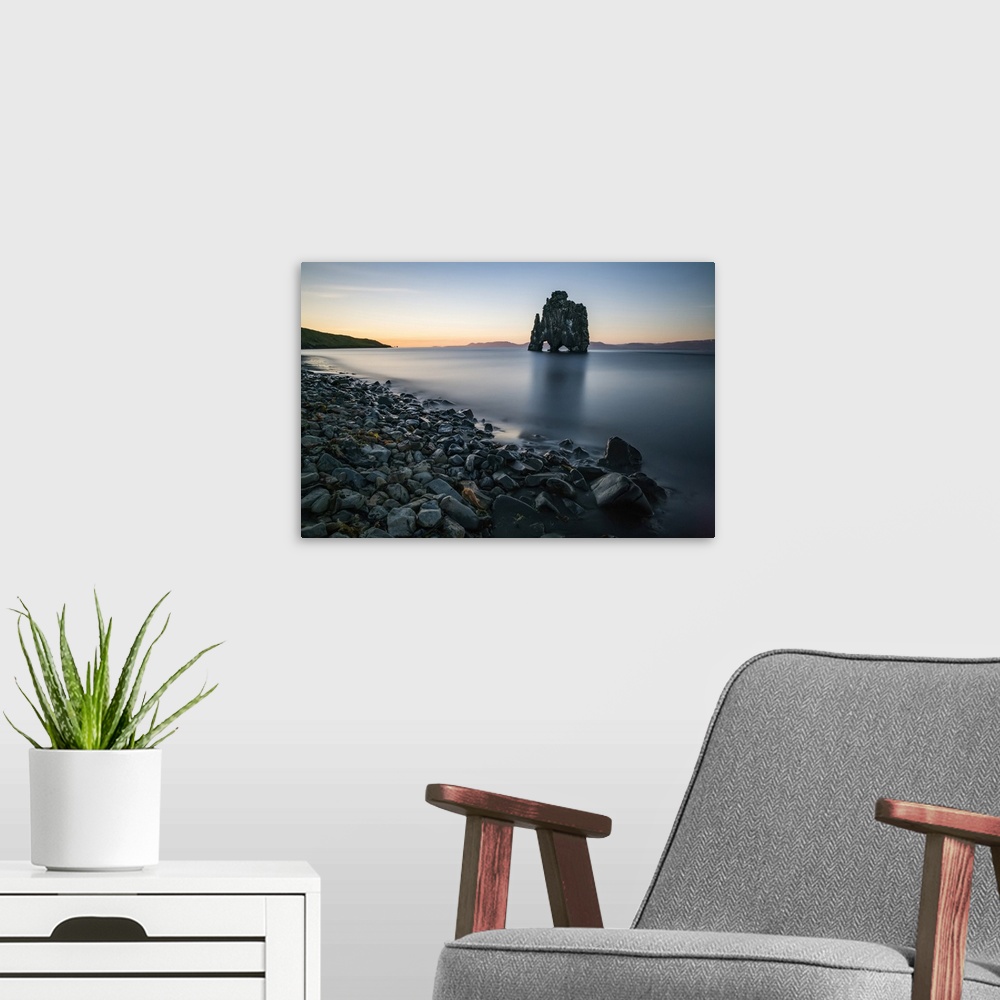 A modern room featuring The rock formation known as Hvitserkur, at sunset, Northern Iceland; Iceland