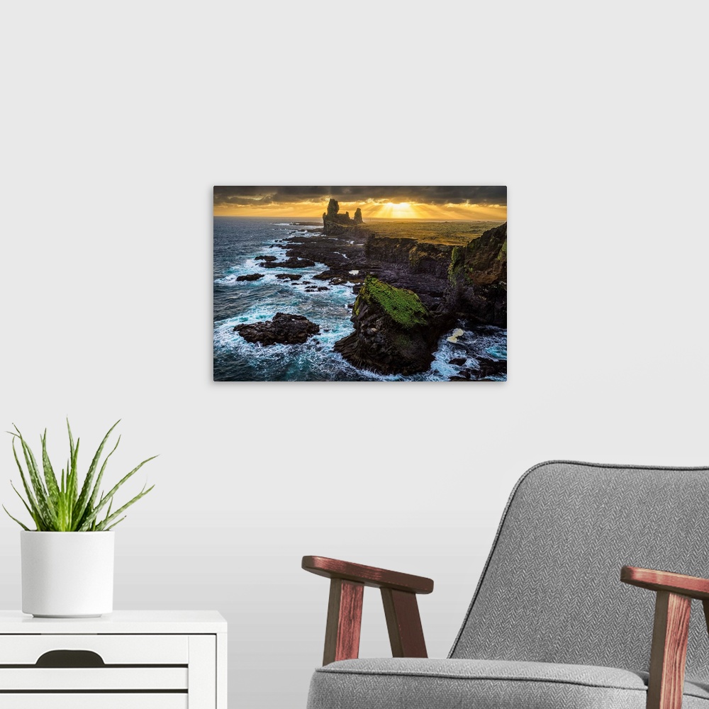 A modern room featuring The sea stack known as Londranger rises above the landscape, Snaefellsnes Peninsula; Iceland