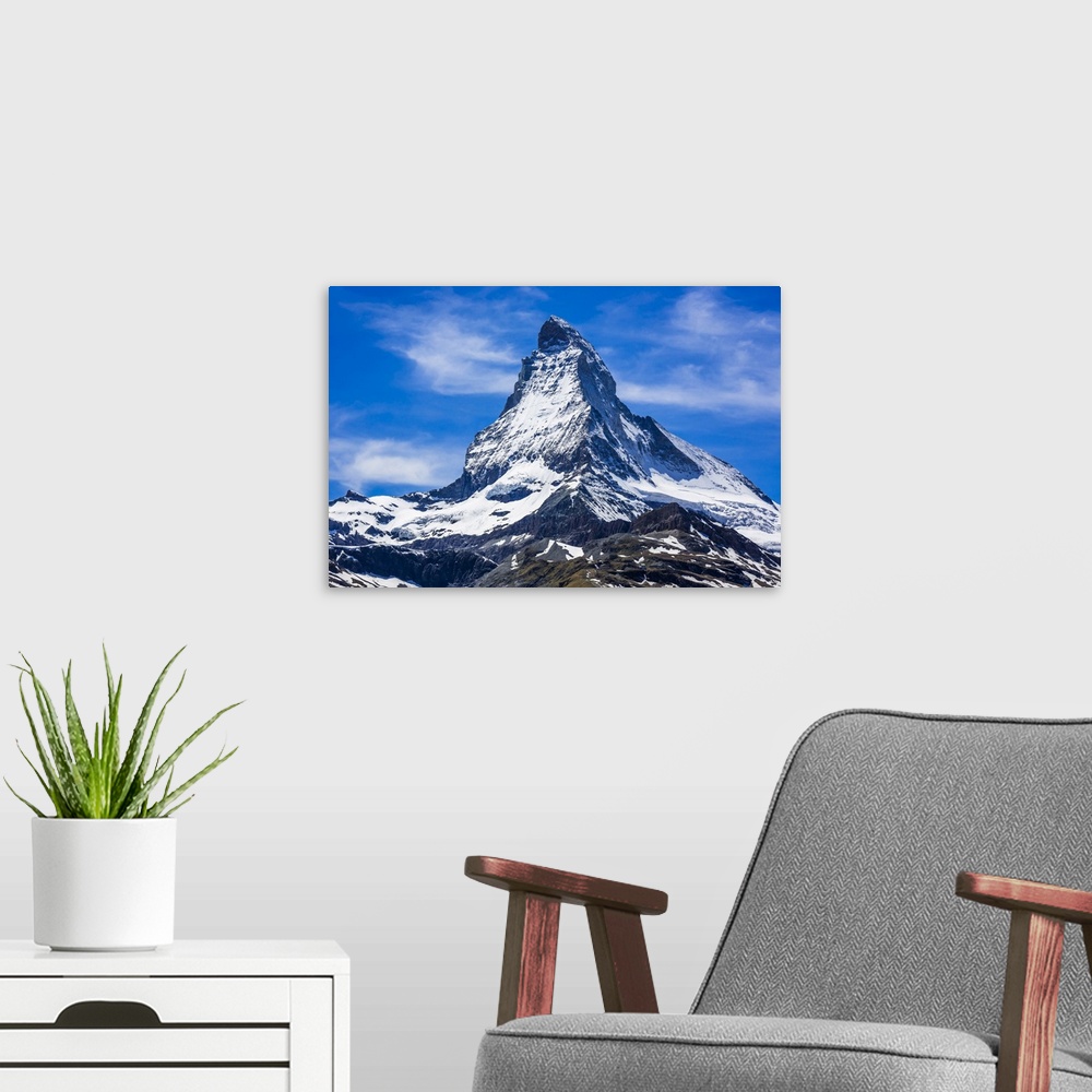 A modern room featuring The snow coverd Matterhorn mountain on a sunny day at Zermatt, Switzerland