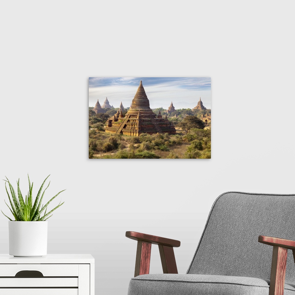 A modern room featuring The Temples and Pagodas of Bagan in Myanmar in early morning.