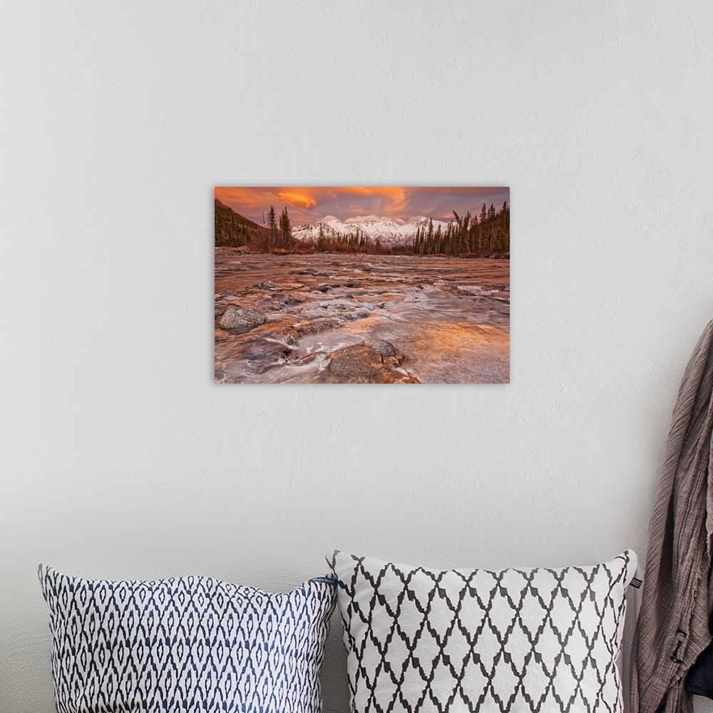 A bohemian room featuring The Wheaton River In Early Winter Snow Covered Mountains, Yukon, Canada