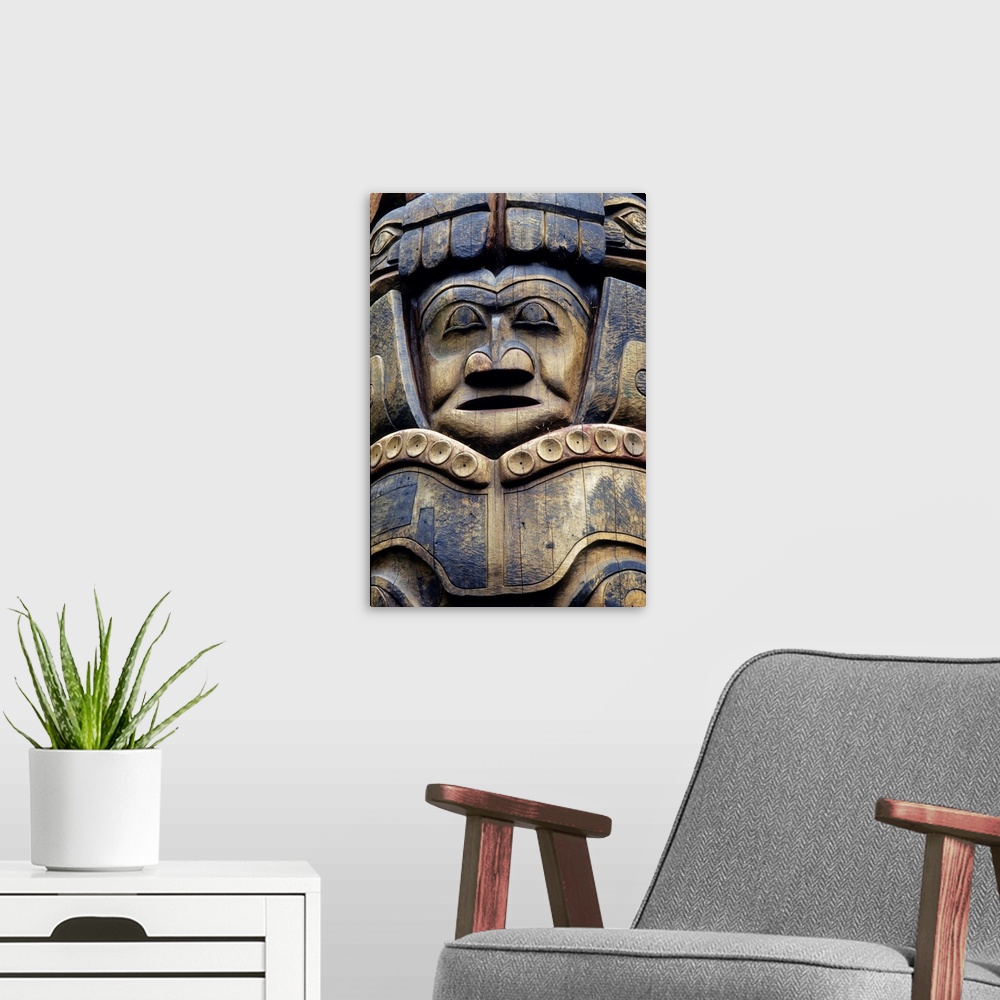 A modern room featuring Closeup of Tlingit totem pole, Sitka national historic park, Sitka, Alaska, southeast, summer.