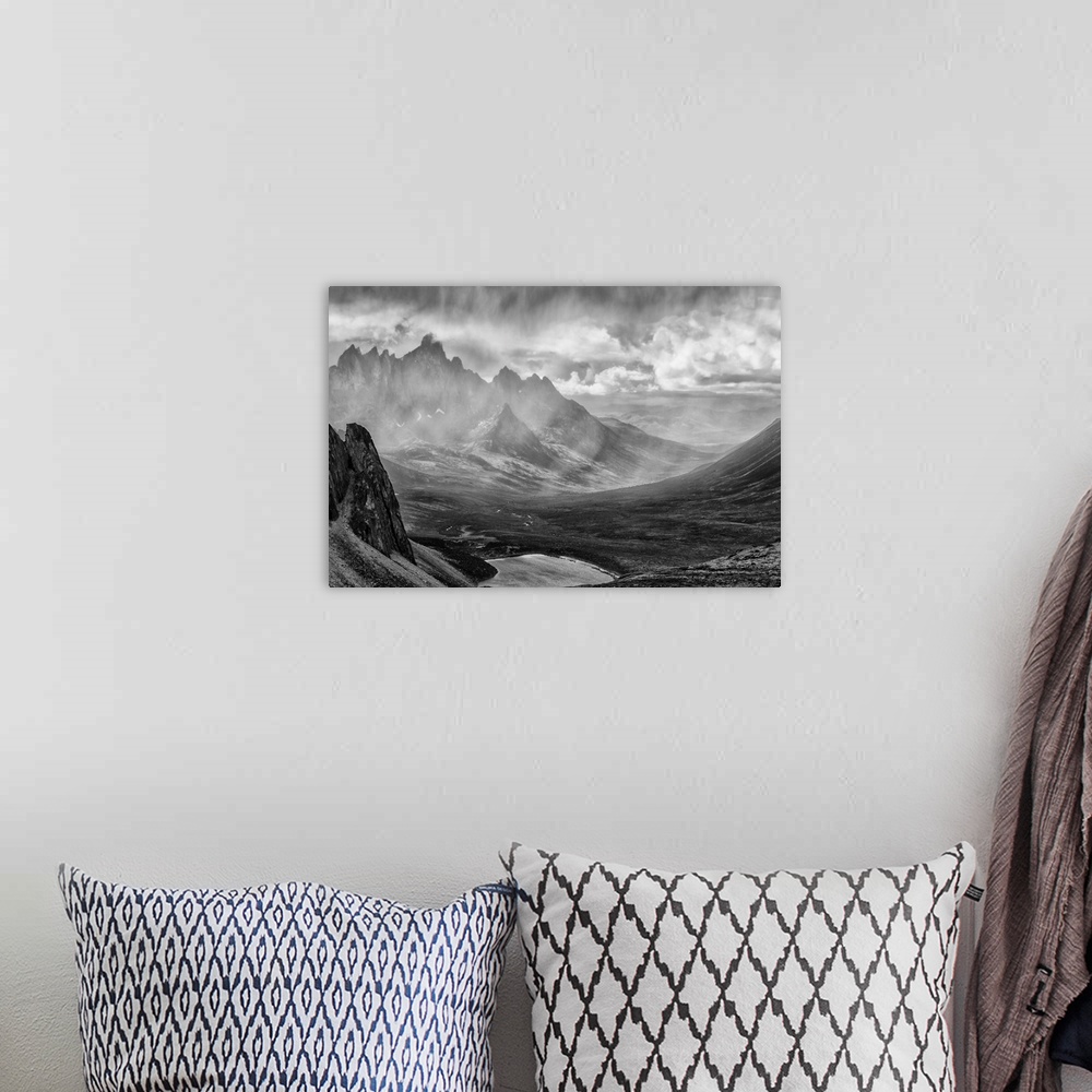 A bohemian room featuring Black and White image of a rain storm over the Tombstone Valley in Tombstone Territorial Park, wi...