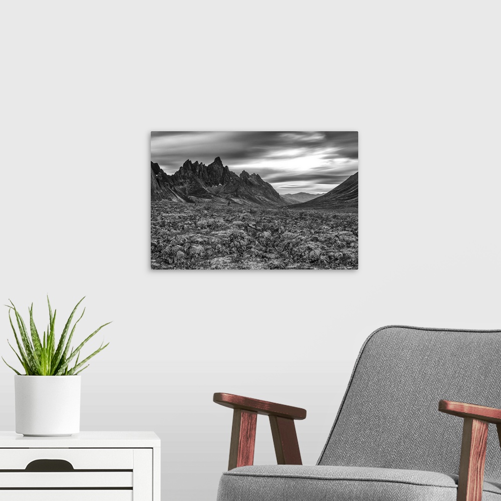 A modern room featuring Black and white image of the Tombstone Valley in Tombstone Territorial Park, Tombstone Mountain i...