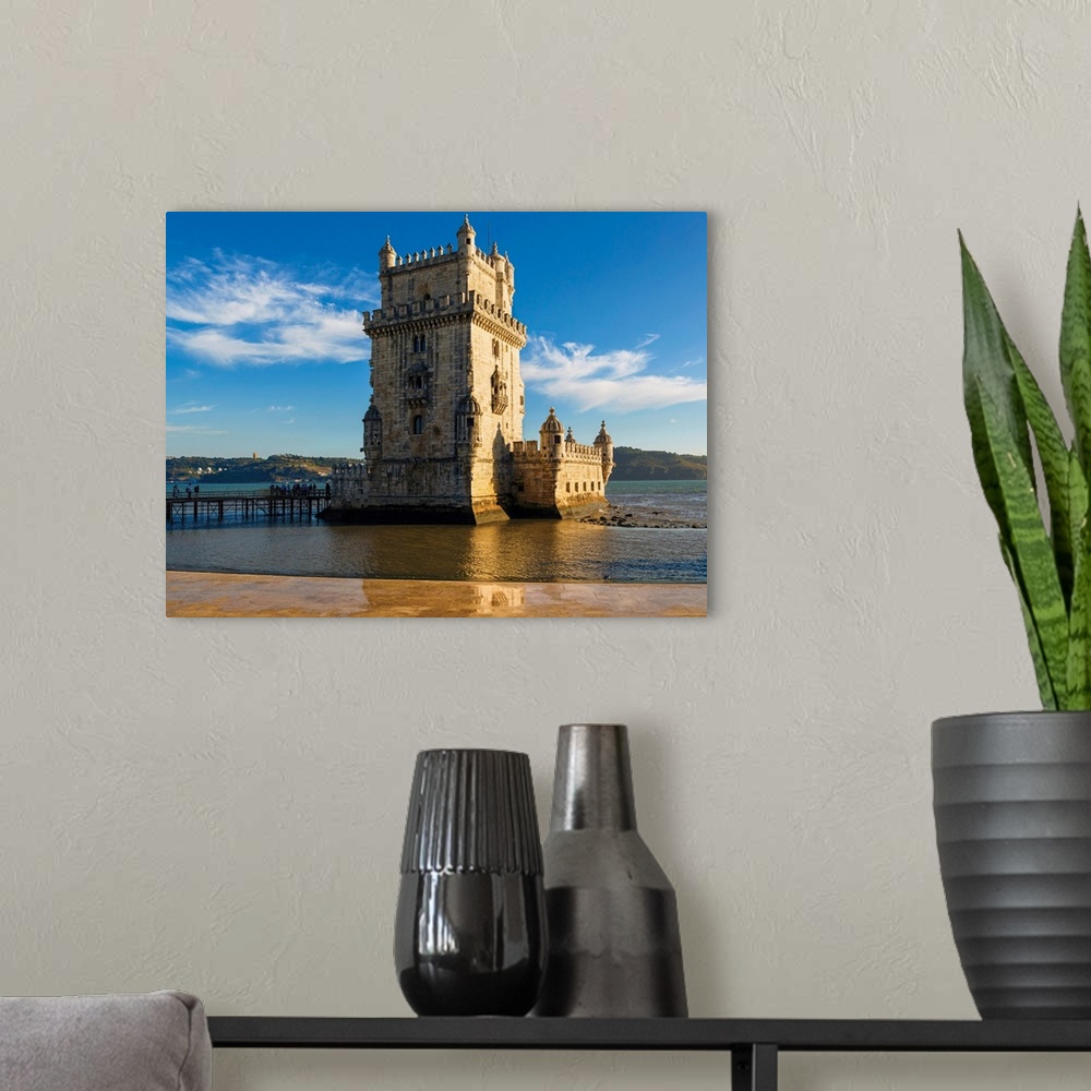 A modern room featuring Lisbon, Portugal. The 16th century Torre de Belem or Belem tower. The tower is an important examp...