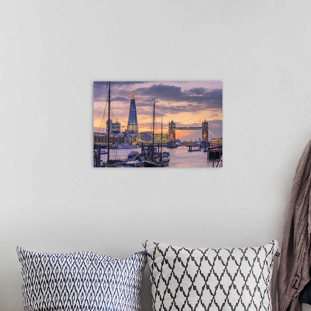 A bohemian room featuring Tower Bridge and The Shard along the River Thames at sunset.