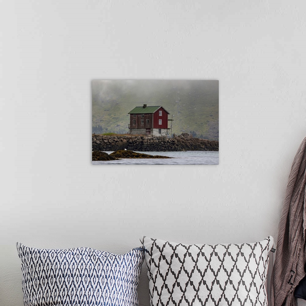 A bohemian room featuring Traditional fishing village house next to the shoreline in Lofoten, Lofoten, Arctic Circle, Norway