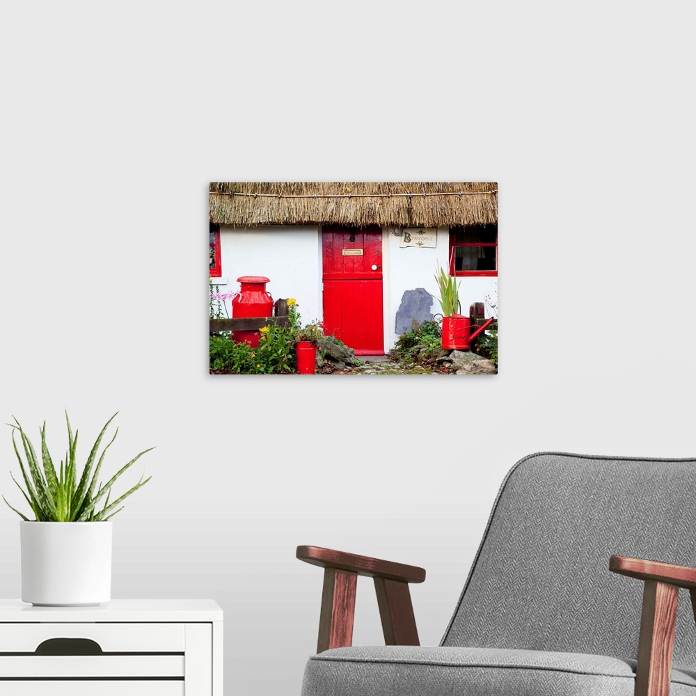 A modern room featuring Traditional Irish Cottage With A Red Door And Red Decorative Items, Currabinny, Ireland