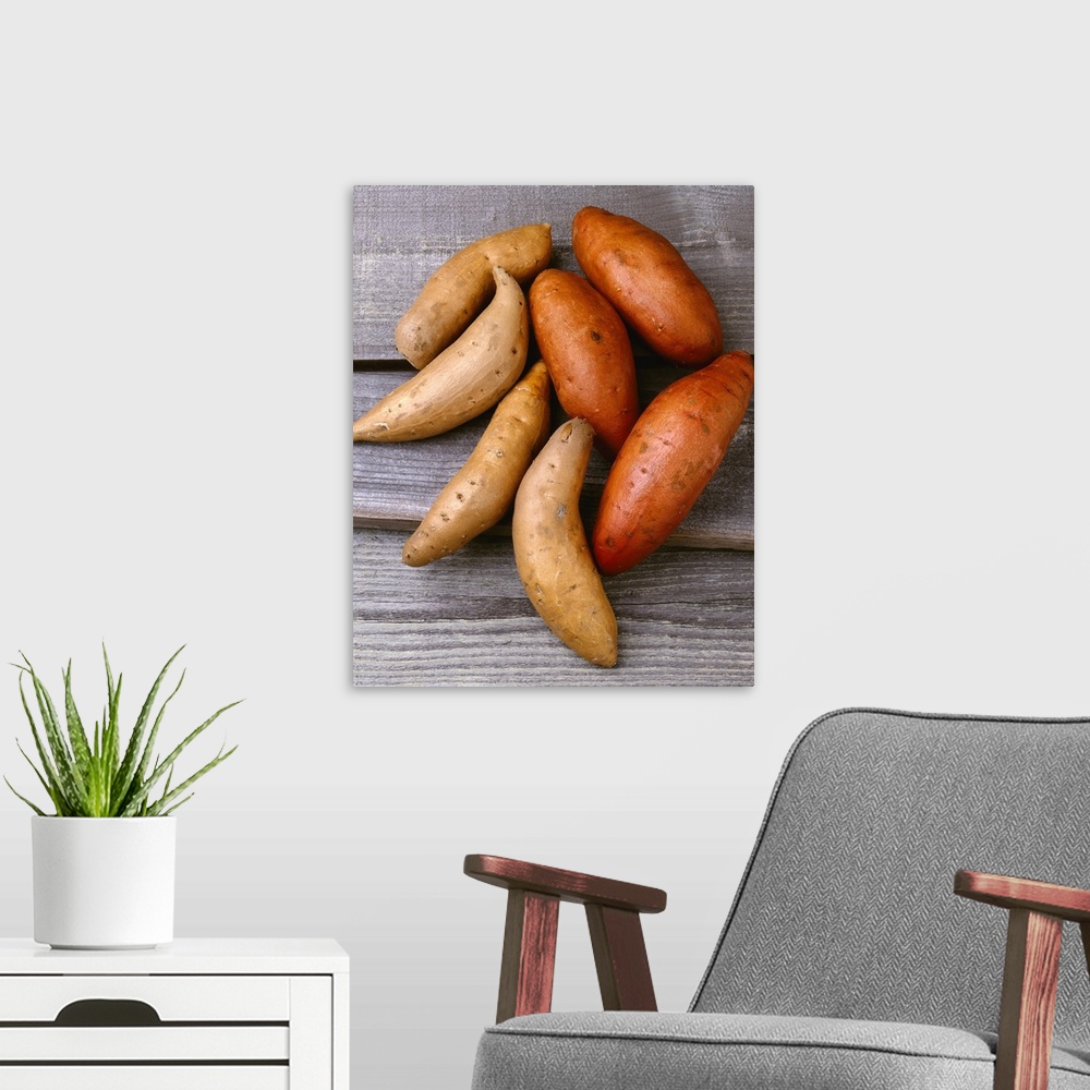 A modern room featuring Traditional sweet potatoes on the left and yams on the right