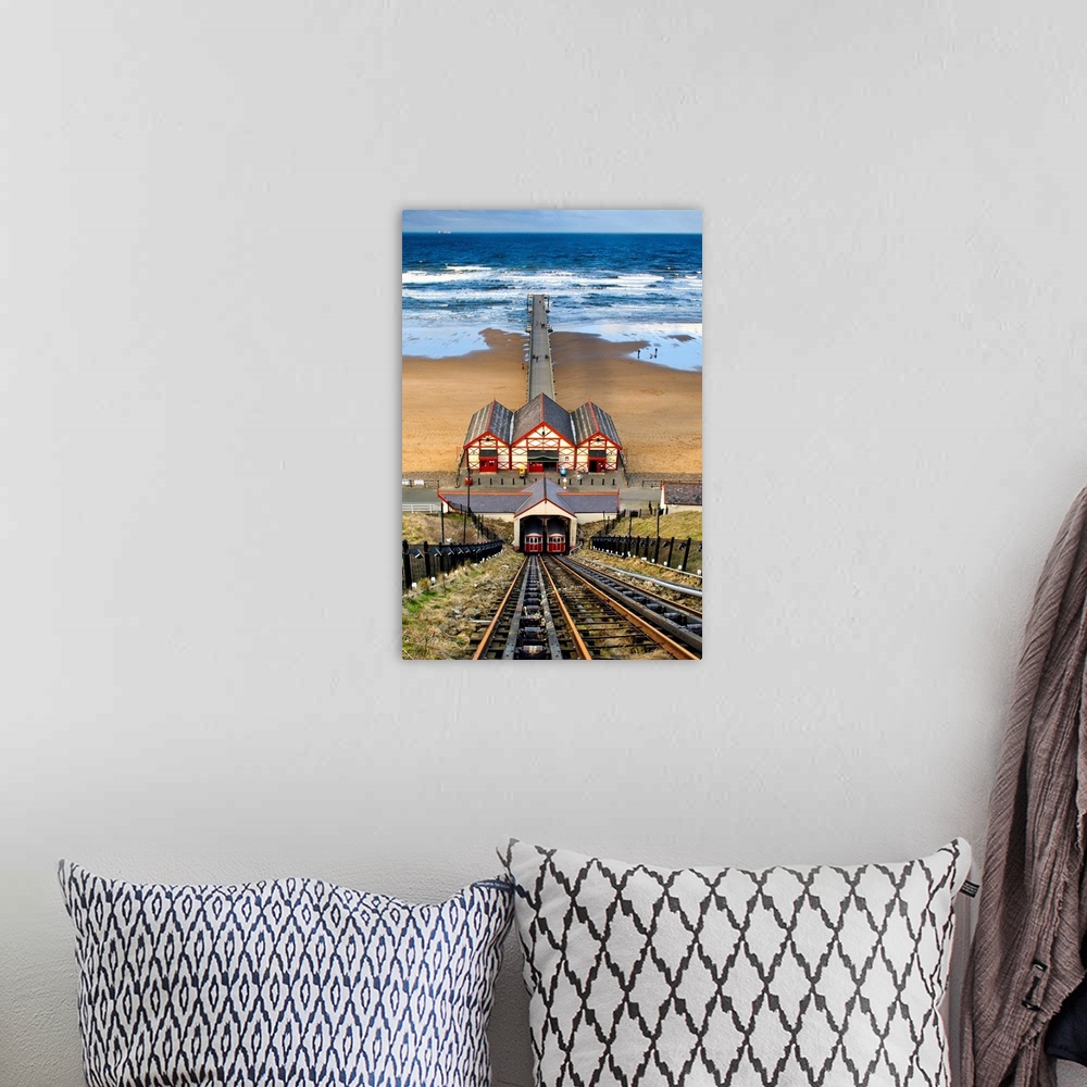 A bohemian room featuring Tram Tracks Leading To Beach, Saltburn, North Yorkshire, England.