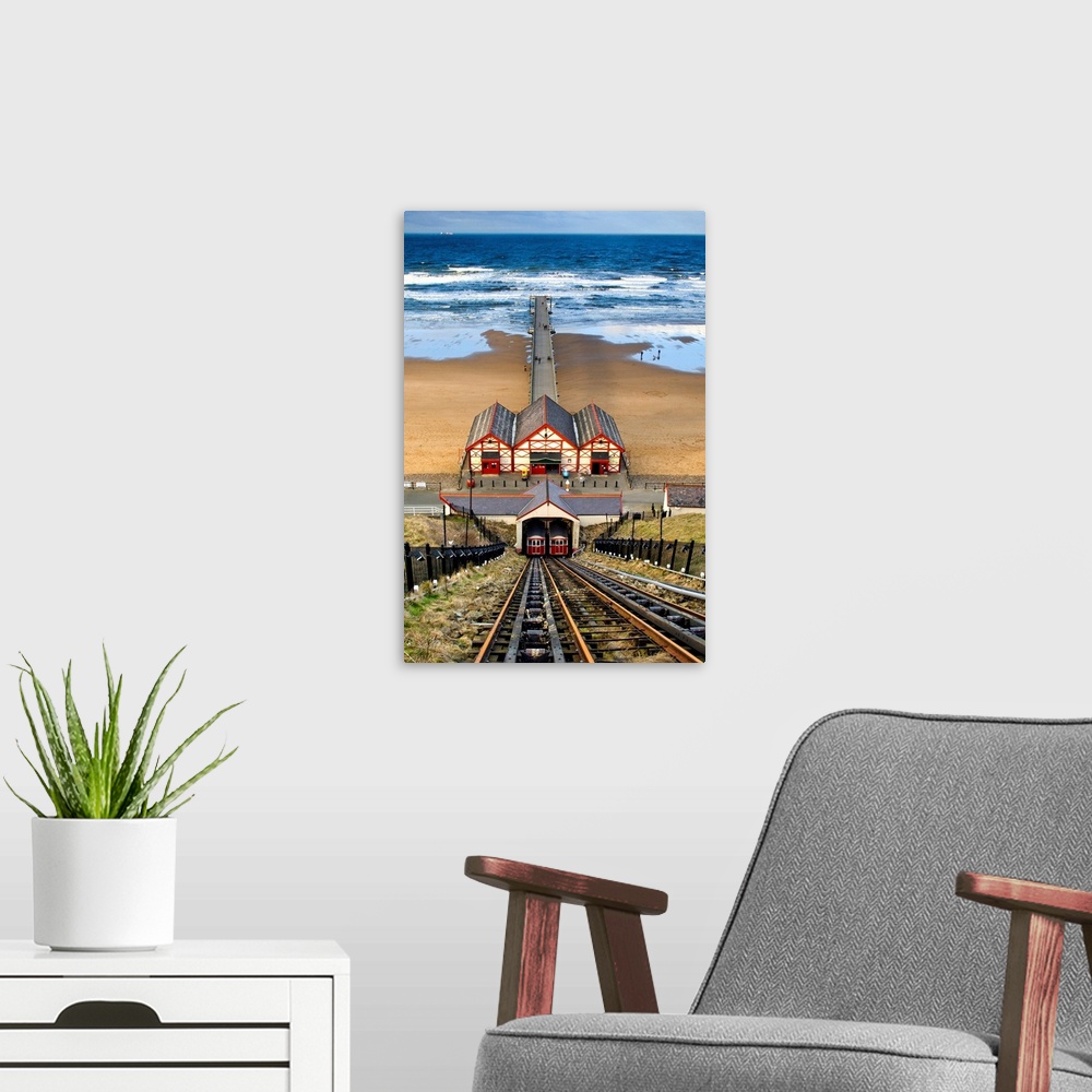 A modern room featuring Tram Tracks Leading To Beach, Saltburn, North Yorkshire, England.