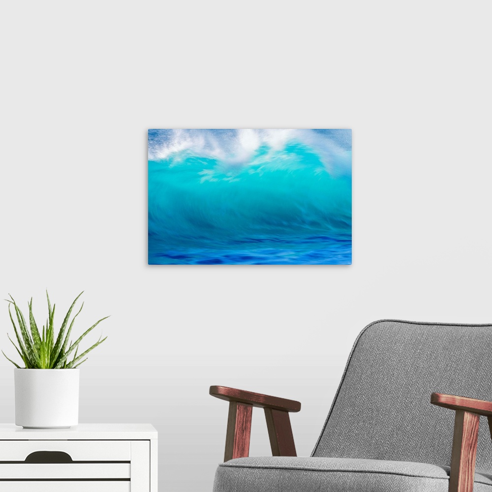 A modern room featuring Turbulent Turquoise Wave With Windspray, Blurred