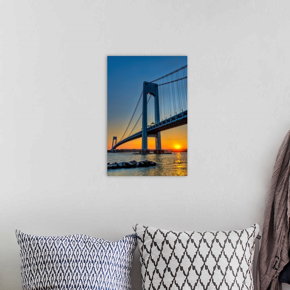 A bohemian room featuring Verrazano-Narrows Bridge at sunset;  Brooklyn, New York, United States of America