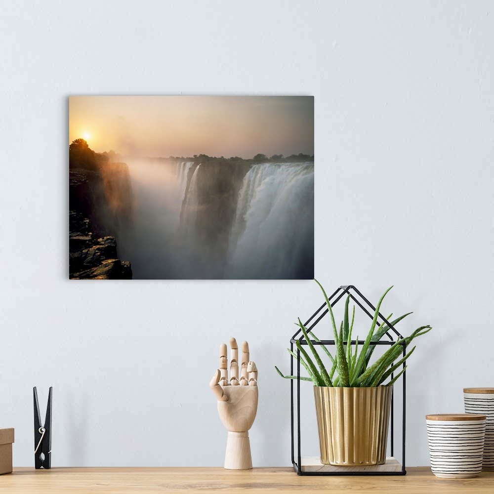 A bohemian room featuring Victoria Falls At Dusk; Zimbabwe