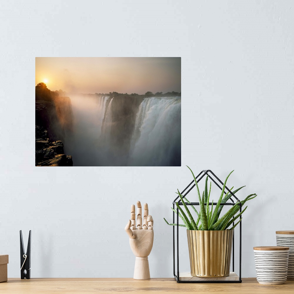 A bohemian room featuring Victoria Falls At Dusk; Zimbabwe