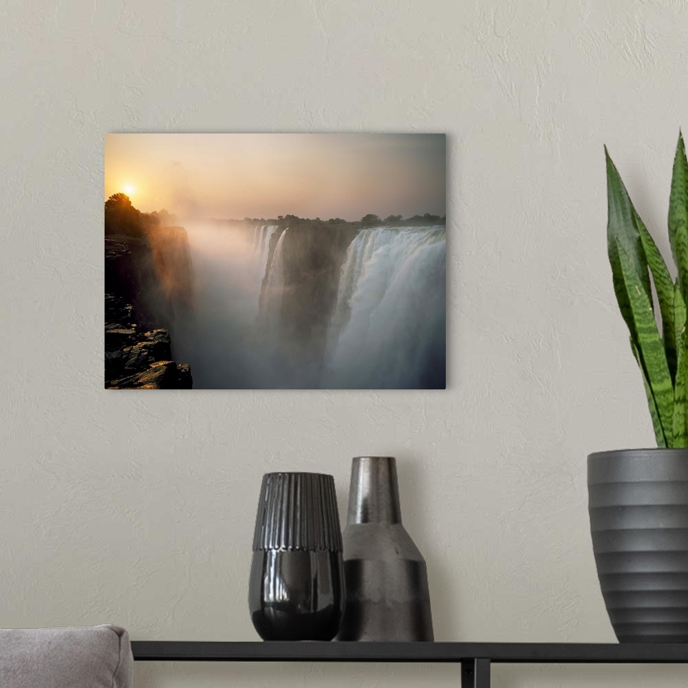 A modern room featuring Victoria Falls At Dusk; Zimbabwe