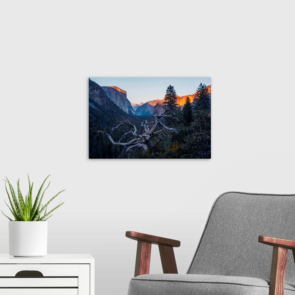 A modern room featuring View of El Capitan and Half Dome at sunset in Yosemite National Park, California, United States o...