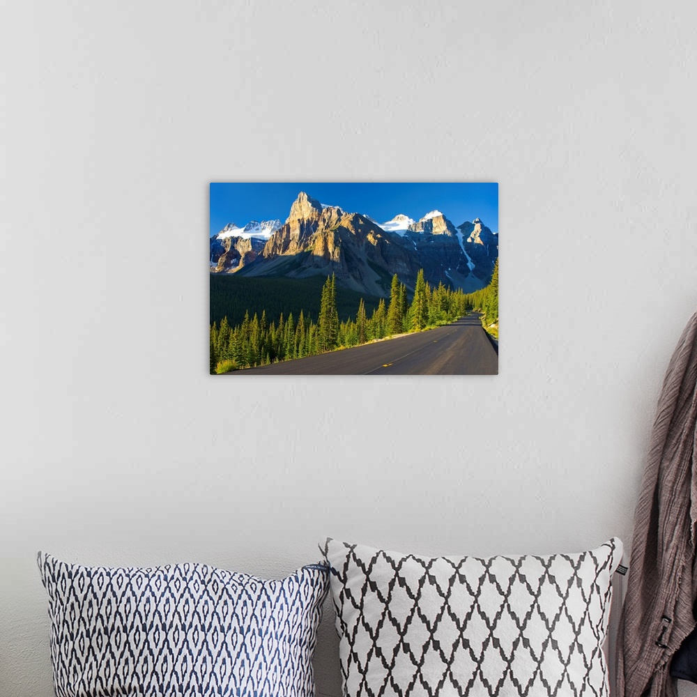 A bohemian room featuring View Of Glacial Mountains And Trees Along The Road; Alberta Canada
