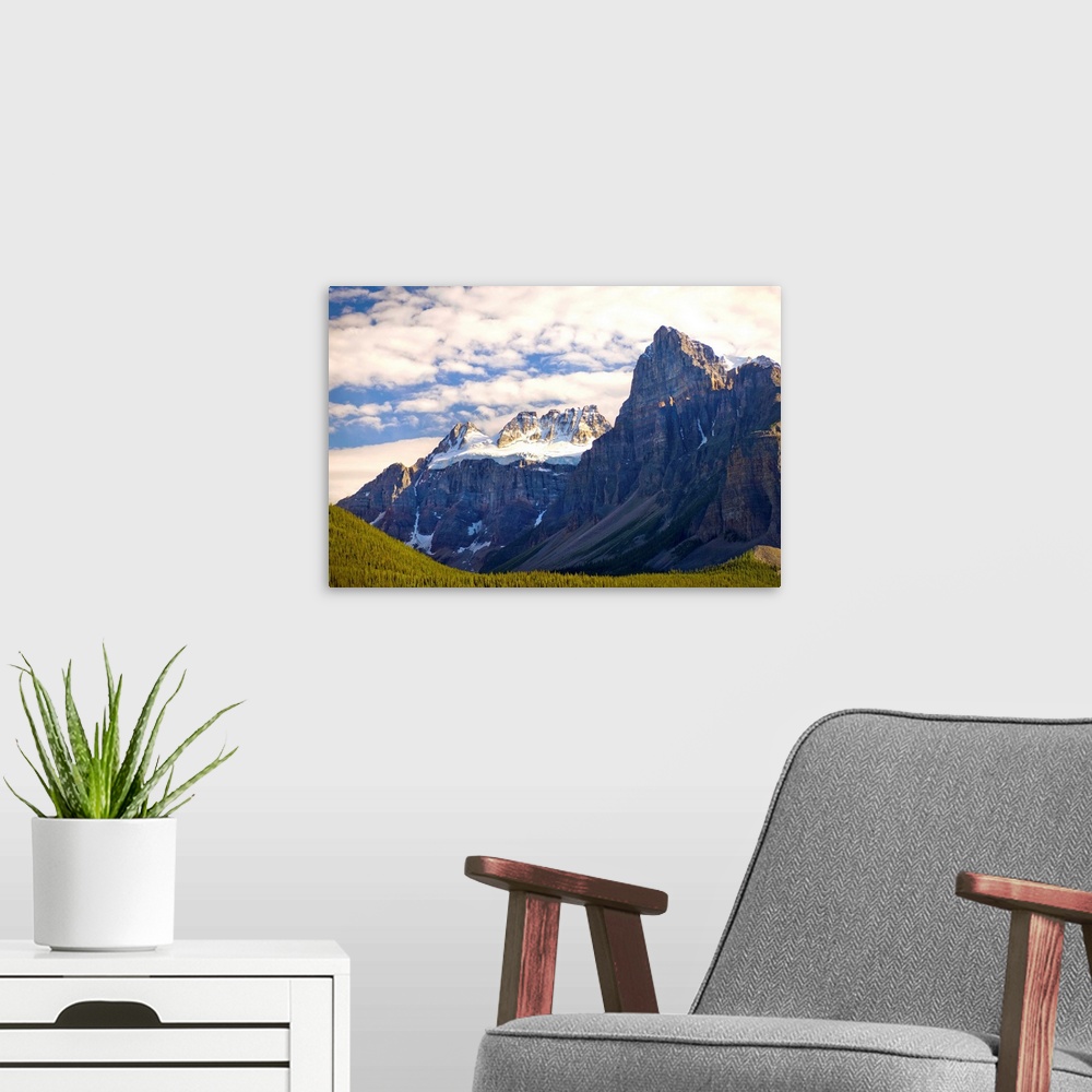 A modern room featuring View Of Glacial Mountains And Trees In Banff National Park; Banff Alberta Canada