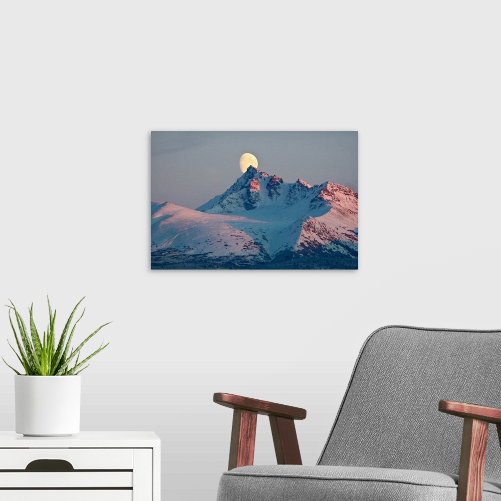 A modern room featuring View of moon rising behind O'Malley Peak, Chugach Mountains, Anchorage, Southcentral Alaska, Winter