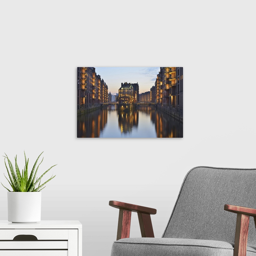 A modern room featuring View of Speicherstadt with River Elbe at Dusk, Hamburg, Germany