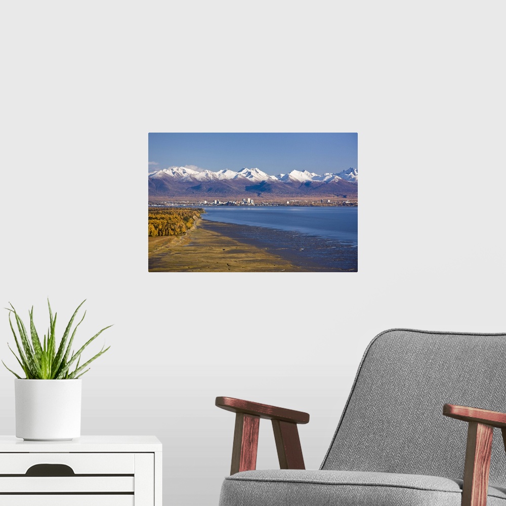 A modern room featuring Aerial view of the Anchorage skyline looking southeast from Point Mackenzie over Knik Arm with th...