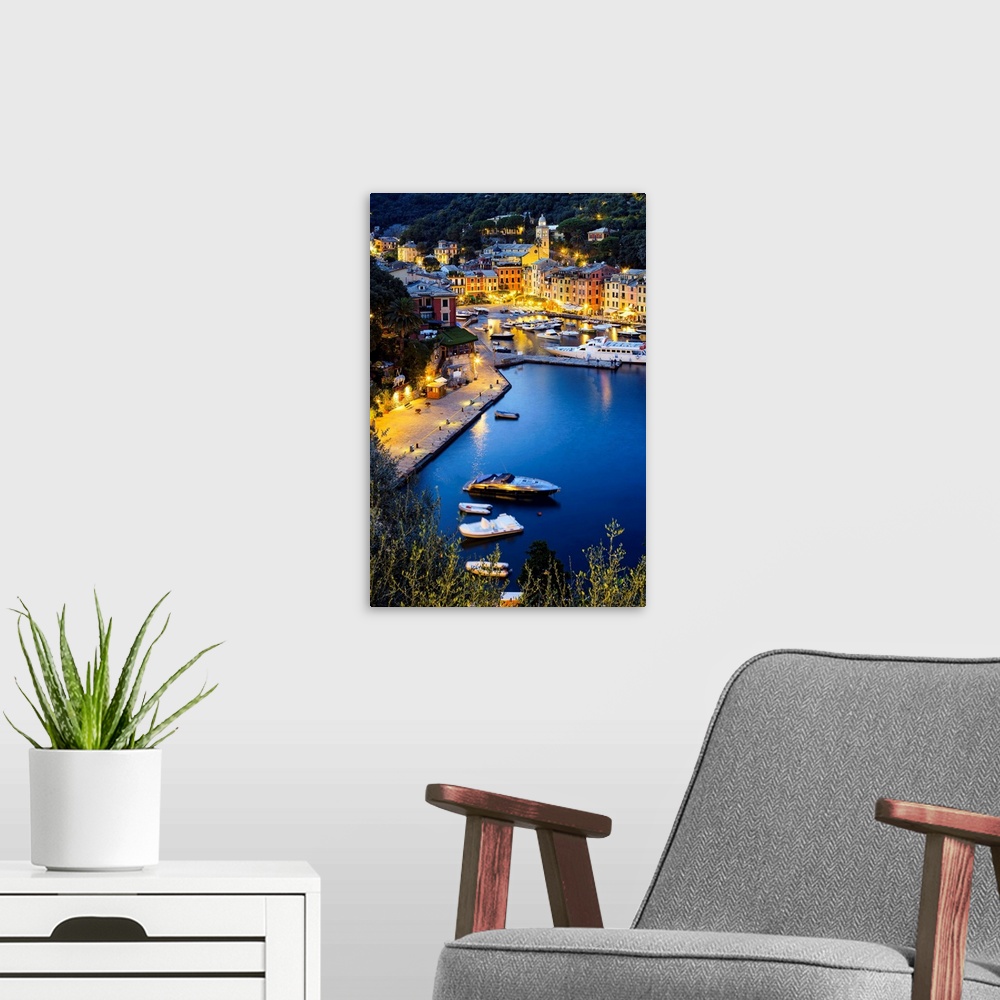 A modern room featuring View of the harbour at dusk, Portofino, Liguria, Italy
