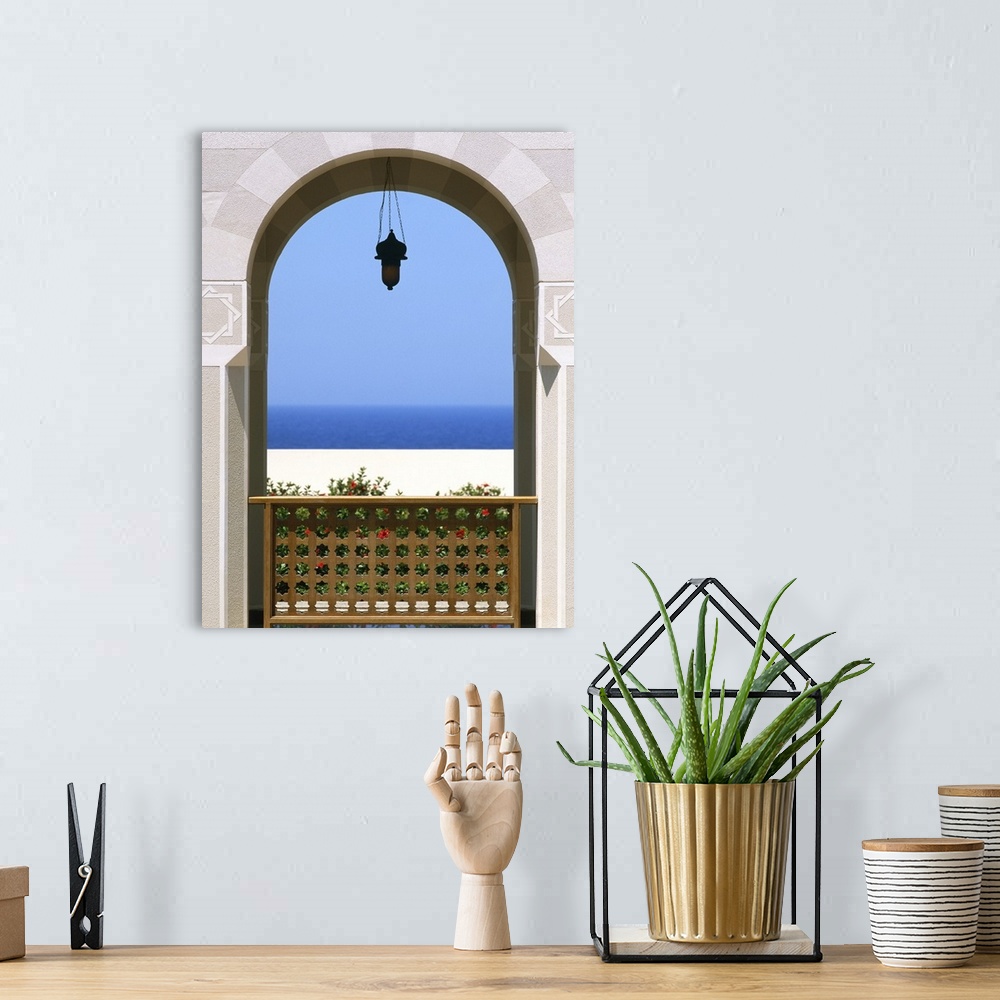 A bohemian room featuring View Through Archway To Beach And Sea