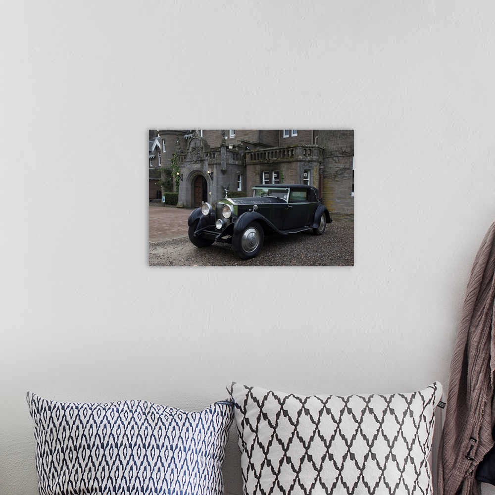 A bohemian room featuring Vintage black car parked outside a large home, Perthshire, Scotland.