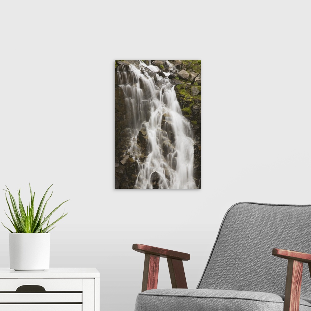 A modern room featuring Waterfall Flowing Over Rocks; Washington