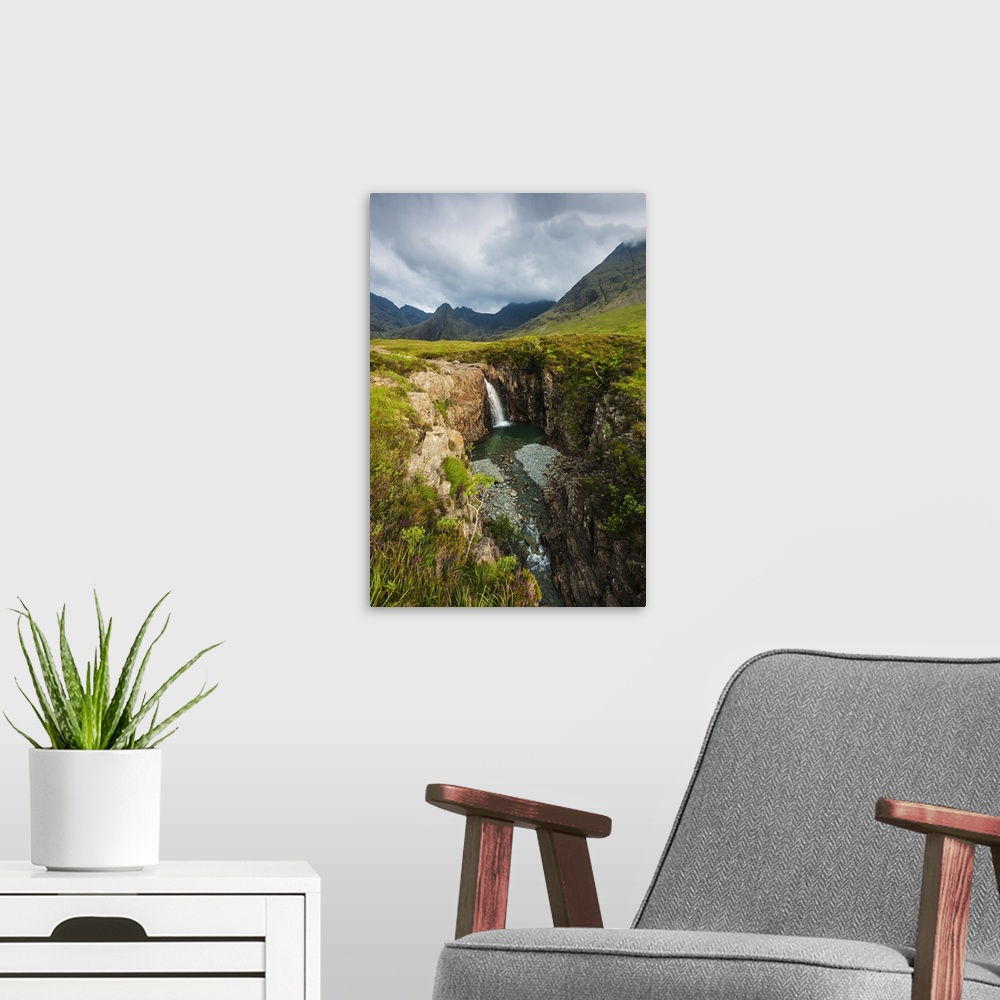 A modern room featuring Waterfall in Coire na Creiche  near Glen Brittle with the hills of the Black Cuillin in the backg...