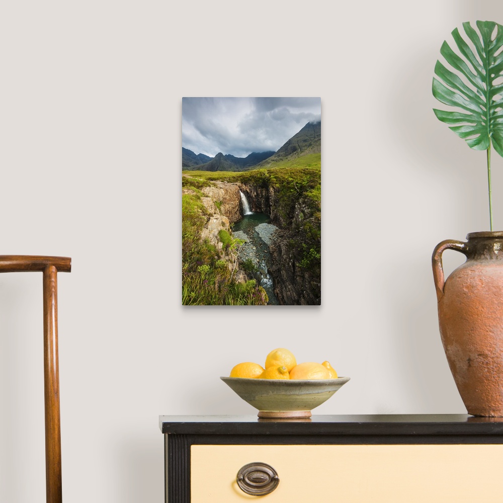 A traditional room featuring Waterfall in Coire na Creiche  near Glen Brittle with the hills of the Black Cuillin in the backg...
