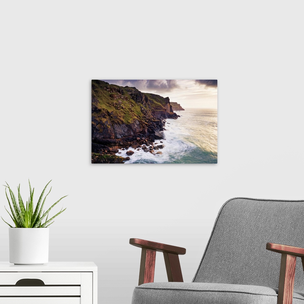 A modern room featuring Waves Breaking below Rugged Sea Cliffs, Rumps Point, Cornwall, England