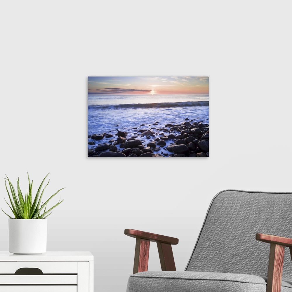 A modern room featuring Waves Breaking on Rocky Shore at Dawn, Near Dunstanburgh Castle, Northumberland, England