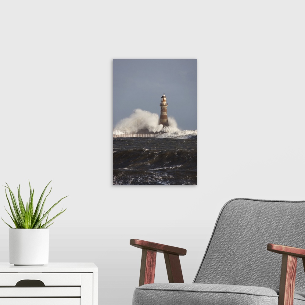 A modern room featuring Waves Crashing Against A Lighthouse; Sunderland, Tyne And Wear, England