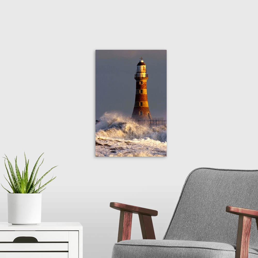 A modern room featuring Waves Crashing Against A Lighthouse, Tyne And Wear, England
