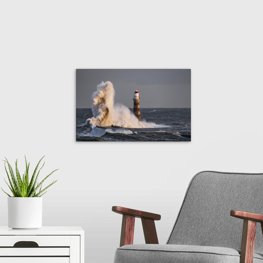 A modern room featuring Waves Splashing Against Roker Lighthouse At The End Of A Pier; Sunderland, Tyne And Wear, England