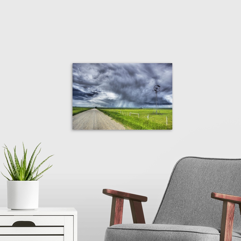 A modern room featuring Windmill And Country Road With Storm Clouds Near Carstairs, Alberta