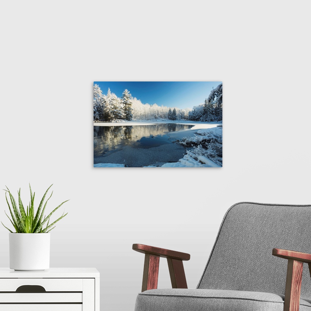 A modern room featuring Winter landscape with ice on a lake. Ontario, Canada.