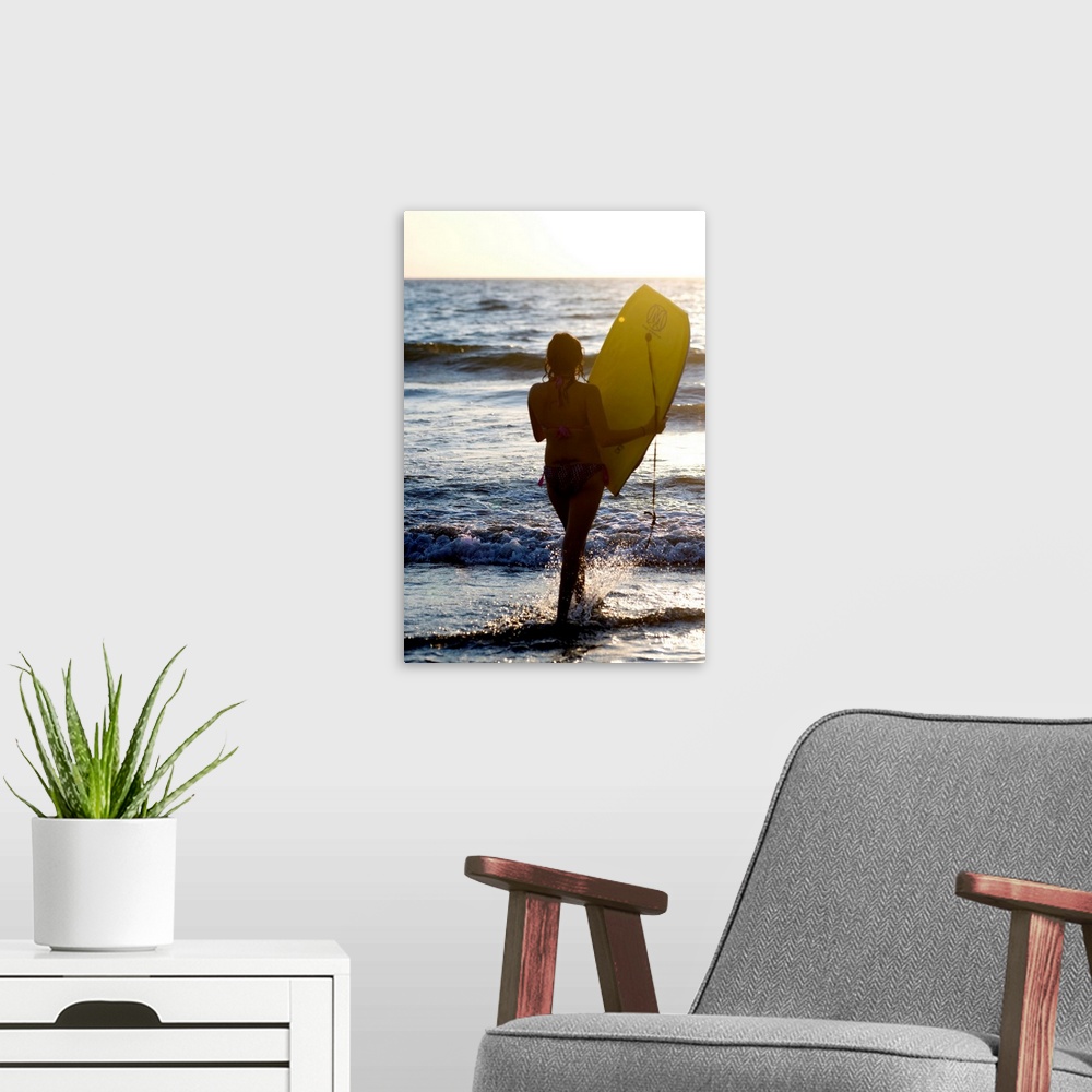 A modern room featuring Woman On Beach Carrying Bodyboard, Puerto Vallarta, Mexico