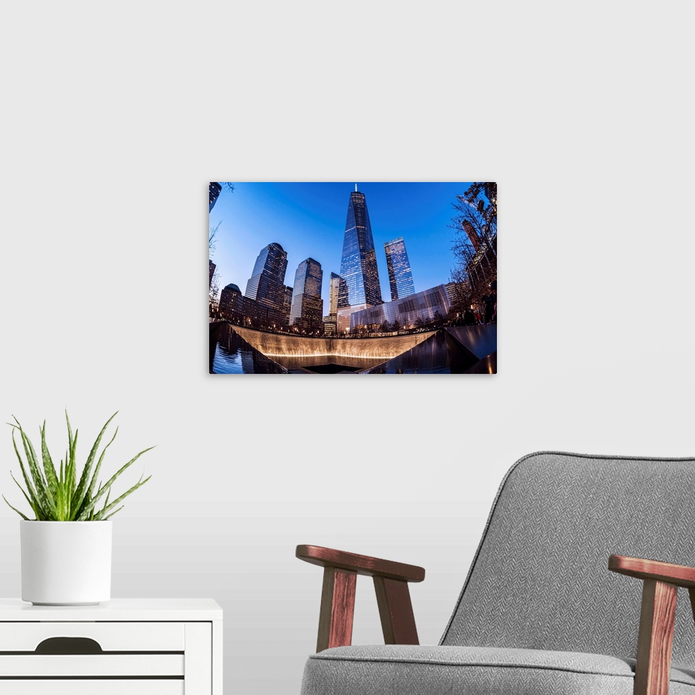 A modern room featuring World Trade Center memorial at twilight, World Trade Centre. New York City, New York, United Stat...