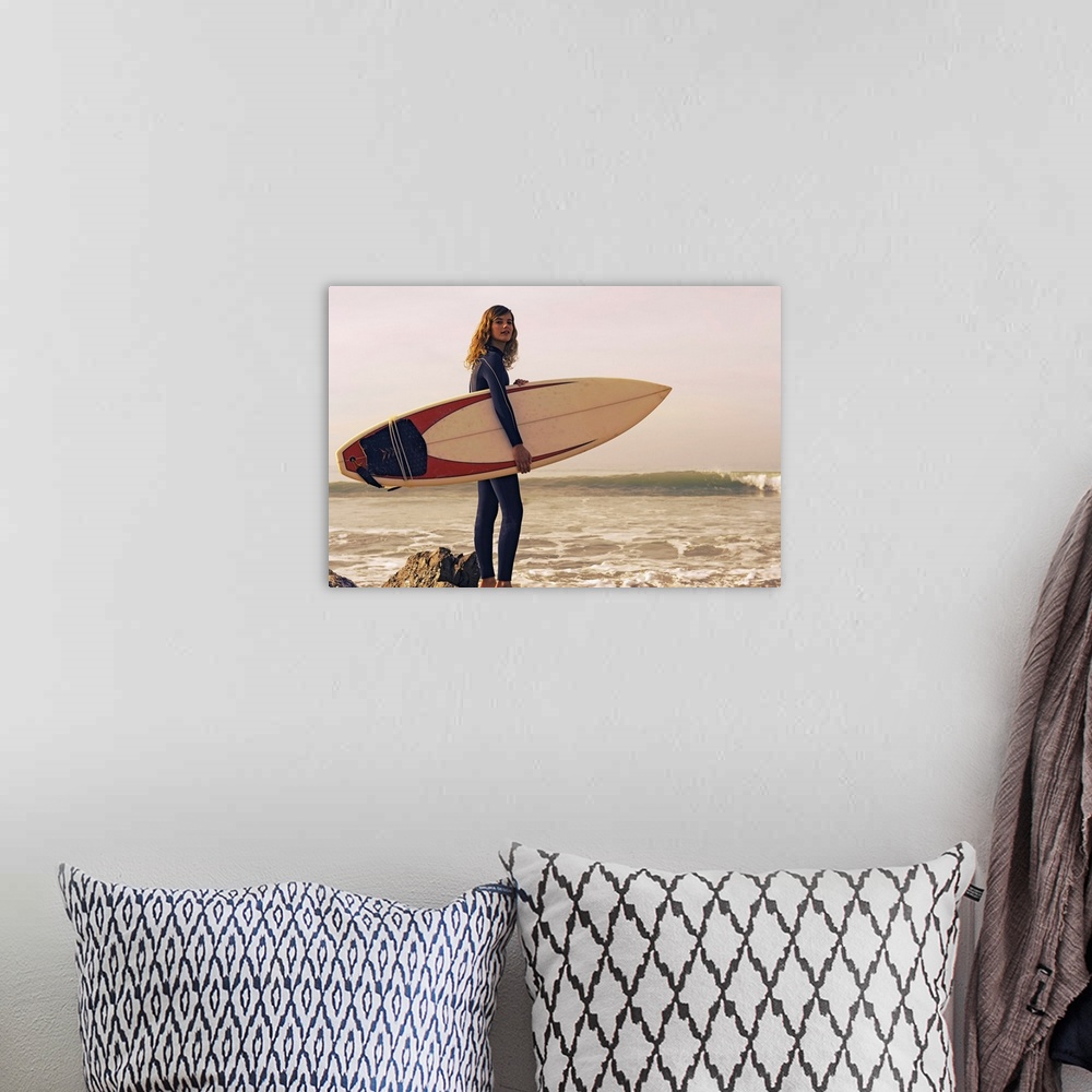 A bohemian room featuring Young Woman With Her Surfboard At The Beach, Tarifa, Cadiz, Andalusia, Spain