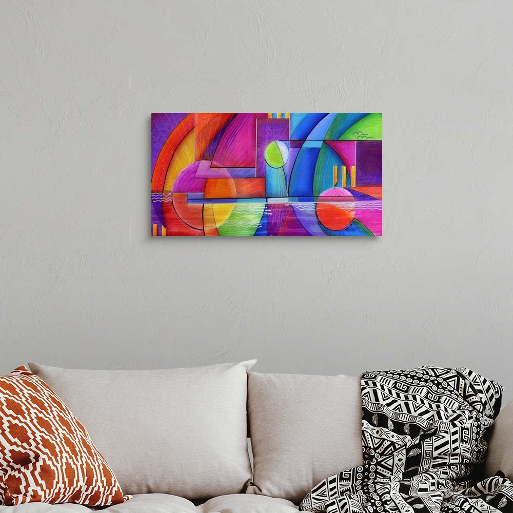 A bohemian room featuring Horizontal abstract painting of vibrant colored shapes in circles and triangles.