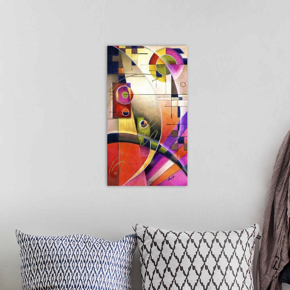 A bohemian room featuring Vertical abstract painting of vibrant colored shapes in circles and triangles.